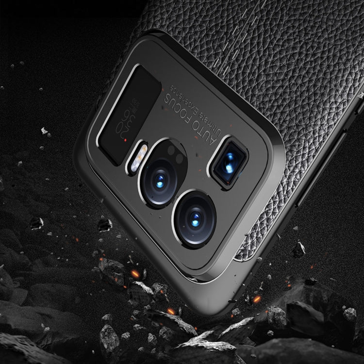 Black shockproof TPU phone case with litchi texture and camera openings