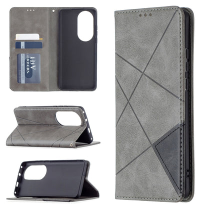 Grey folio phone case with flip cover showing camera cutout and internal card slots; rhombus pattern.