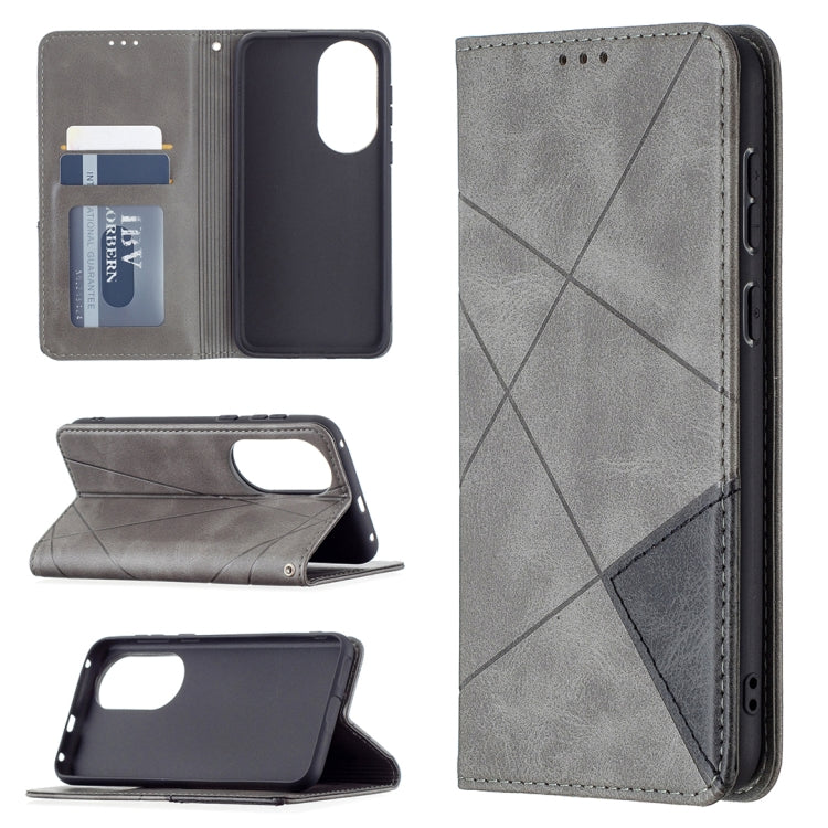 Grey magnetic flip wallet case with rhombus texture; front cover folds open for card access.