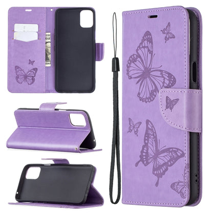 Purple leather phone wallet case with embossed butterflies, card slots, and lanyard
