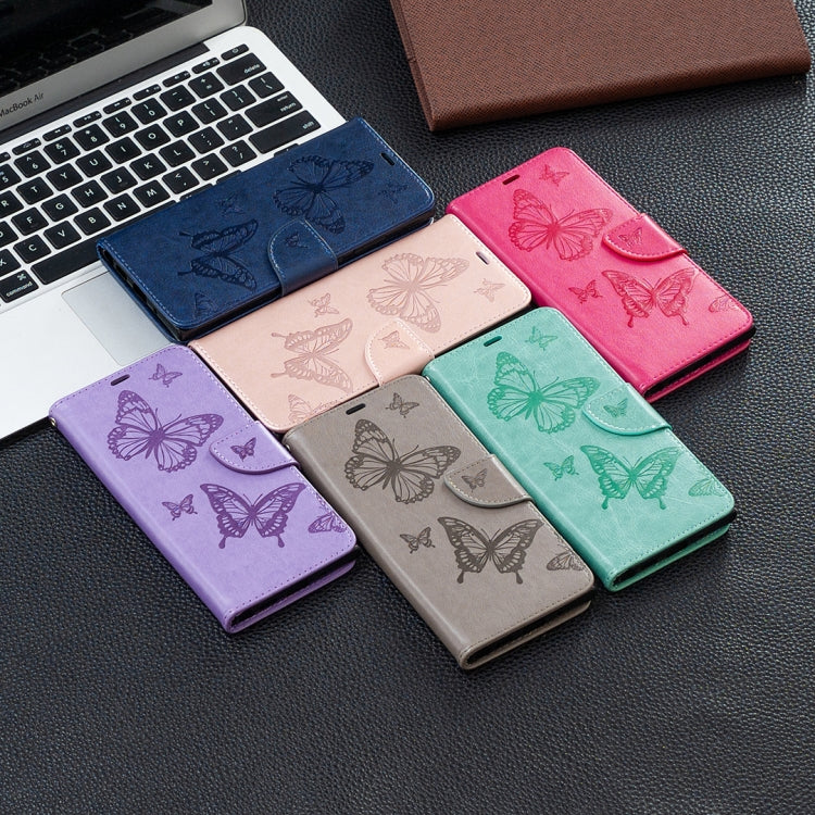 Assorted butterfly-embossed phone wallet cases with card slots and lanyard straps, mixed colors