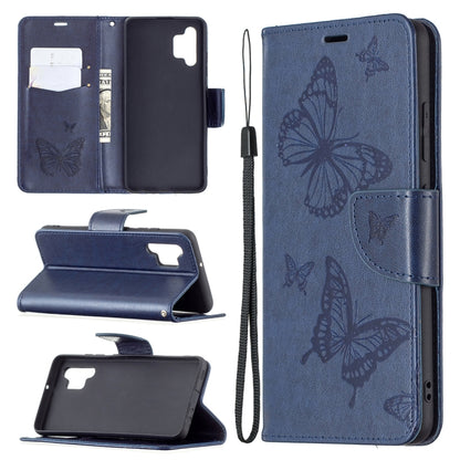 Blue butterfly-embossed phone wallet case with card slots, flip stand, and lanyard strap