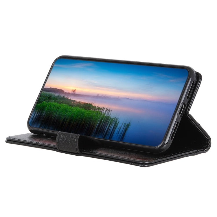 Black leather flip phone case folded into a viewing stand