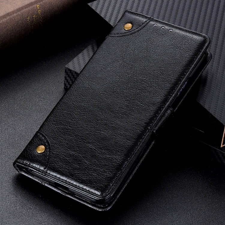 Black leather flip phone case lying closed with copper snap details