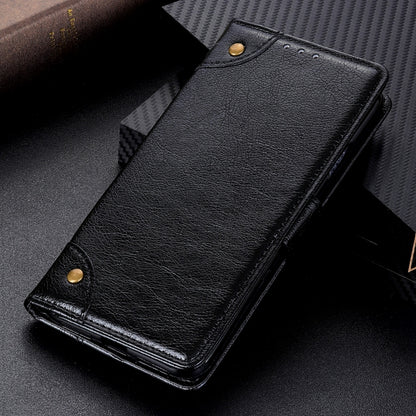 Black leather flip phone case lying closed with copper snap details