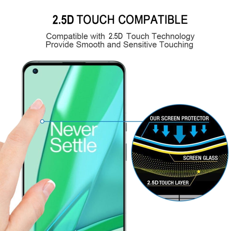 Curved tempered glass screen protector aligned on a smartphone display with a hand