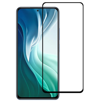 Curved tempered glass screen protector installed on a smartphone with blue wallpaper