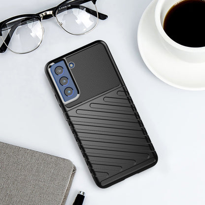 Black shockproof TPU phone case with ribbed grip pattern and camera openings