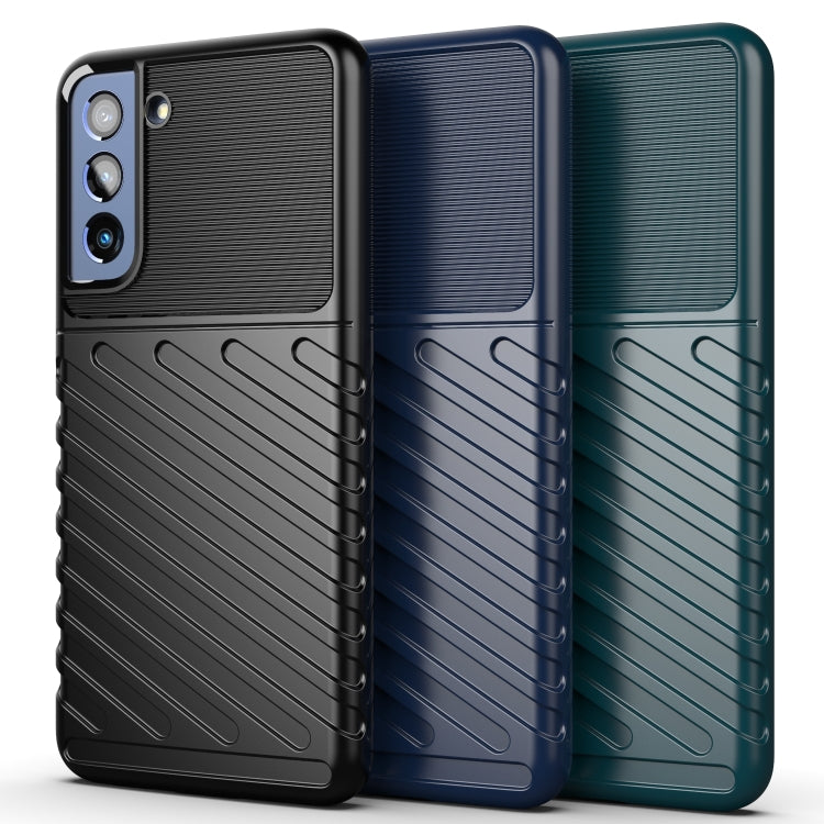 Shockproof TPU phone cases in black, blue, and teal with ribbed texture