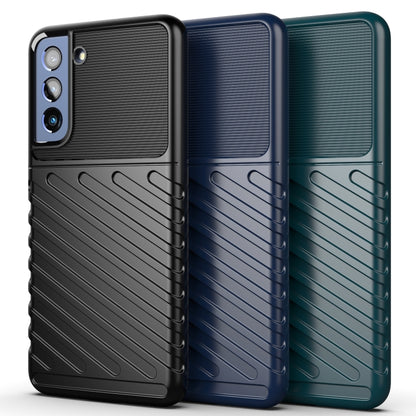Shockproof TPU phone cases in black, blue, and teal with ribbed texture