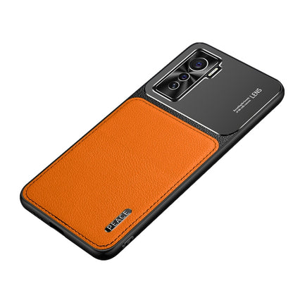 Protective phone case with frosted metal camera top and orange leather-texture back