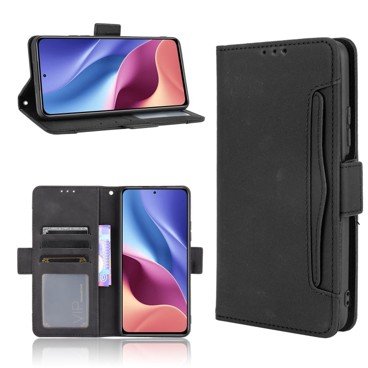 Black leather flip phone case, open card tray and side strap holder detail.