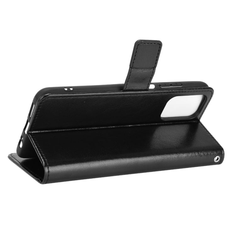 Black leather flip phone case folded out as a viewing stand