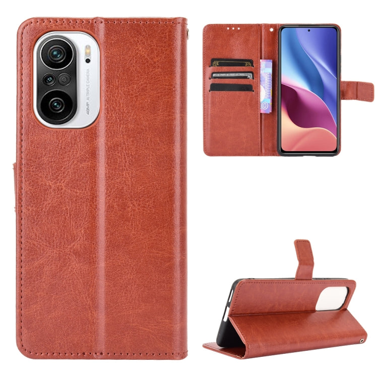 Brown leather flip phone case with card slots and front camera cutout; stand included.