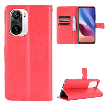 Red leather flip phone case with card slots and camera cutout; viewing stand design.