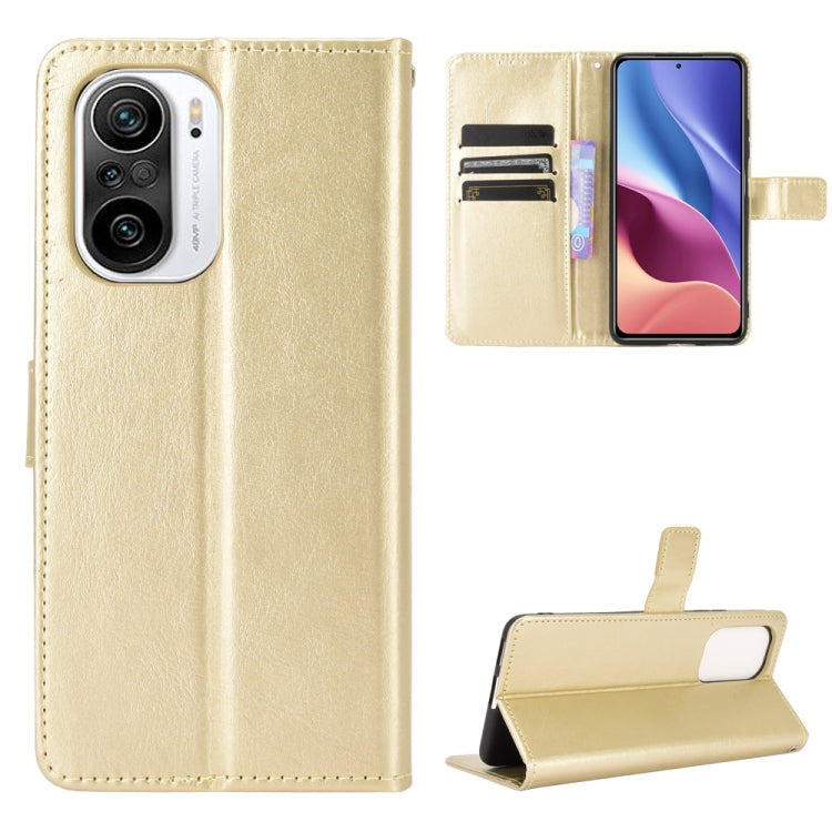 Gold leather flip phone case with card slots and camera cutout; built-in stand.