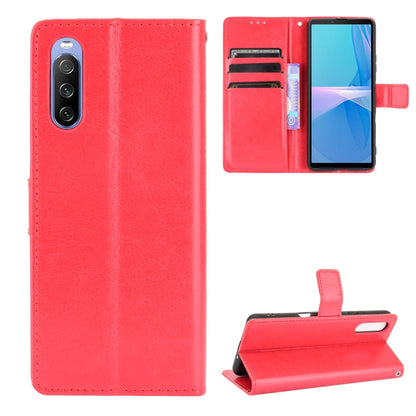 Red flip phone wallet case with card slots and photo holder, leather-look texture.