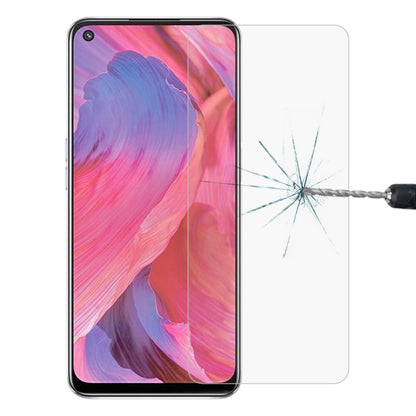 Tempered glass screen protector on a smartphone with purple-pink display