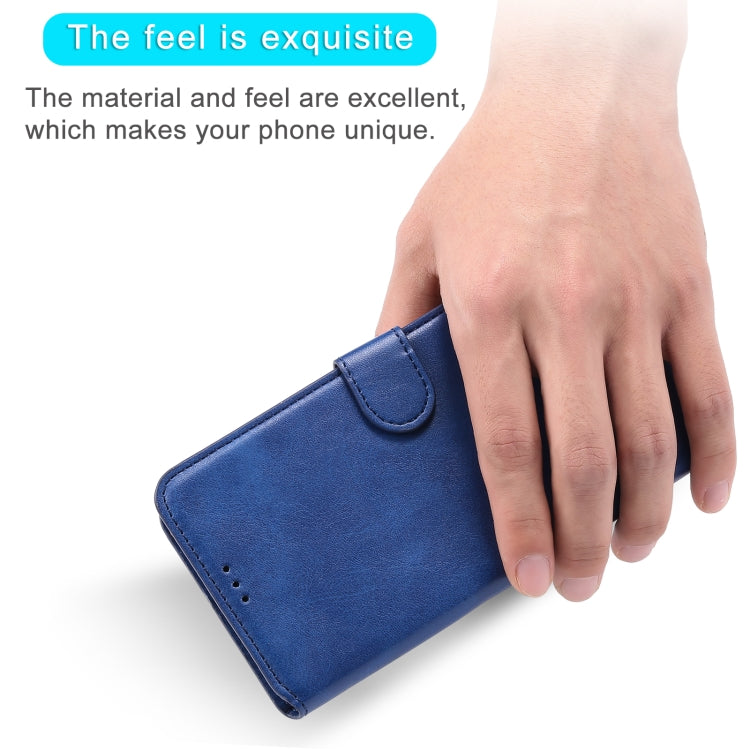 Blue flip wallet phone case with magnetic strap and stitched flap, held in hand