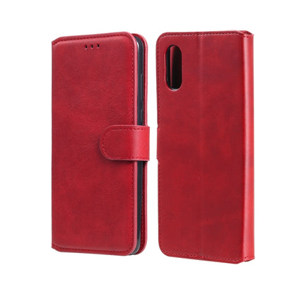 Red flip phone wallet case with magnetic strap and camera cutout.