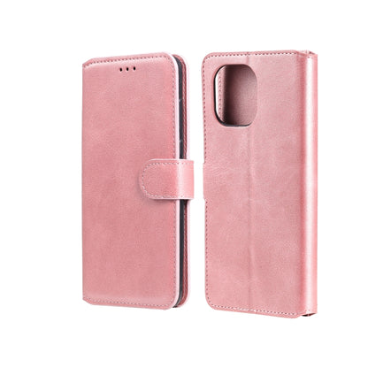 Pink flip leather-look phone case with side strap and camera cutout pocket.