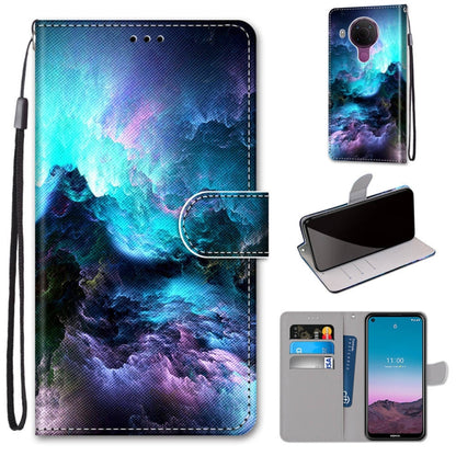 PU leather flip phone wallet case with card slots and lanyard; blue mountain cloud abstract design.
