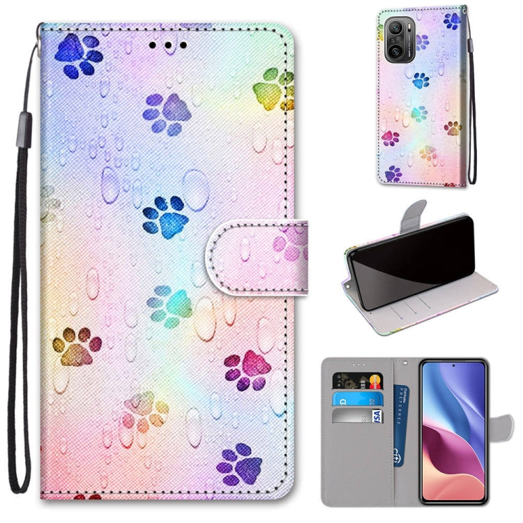 Phone wallet case with multicolor paw print pattern, magnetic flap, card slots, wrist strap