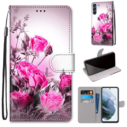 Pink floral PU leather phone wallet case with flip cover, card slots, and wrist strap