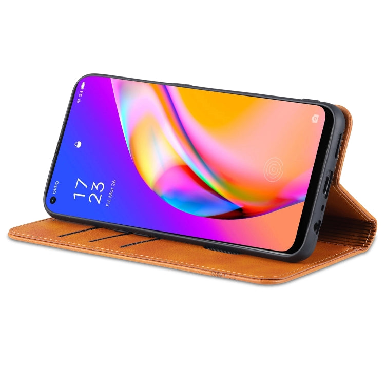 Brown leather flip phone case in landscape stand mode with card slot panel.