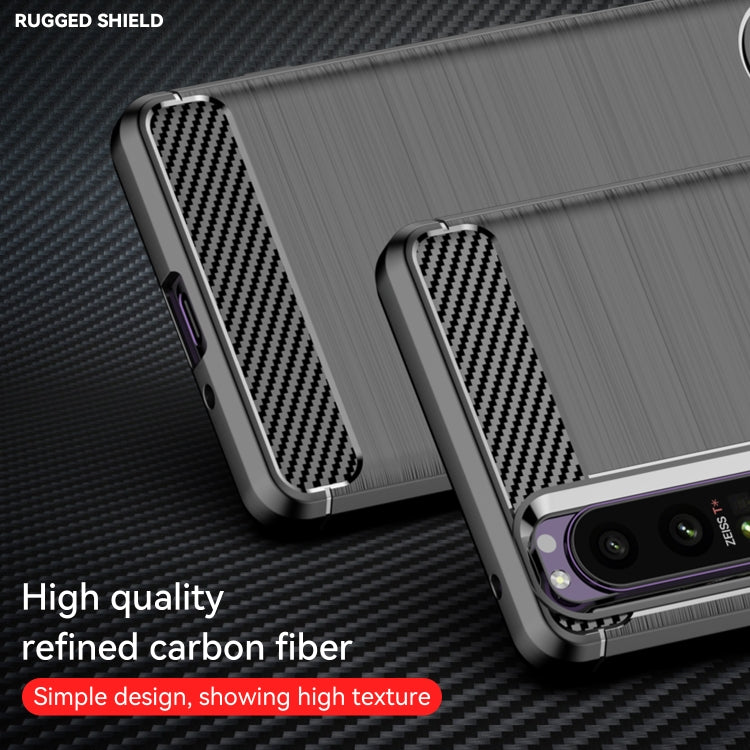 Brushed TPU phone case with carbon-fiber corner inserts and camera protection