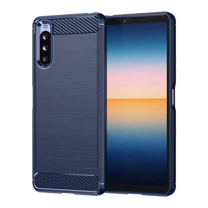 Navy blue carbon fiber TPU phone case with brushed texture, camera cutout.
