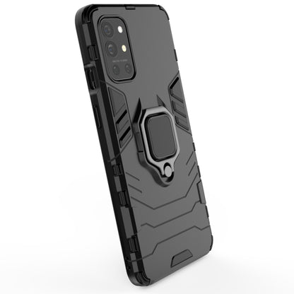 Rugged black phone case with magnetic ring holder, back view with camera cutouts