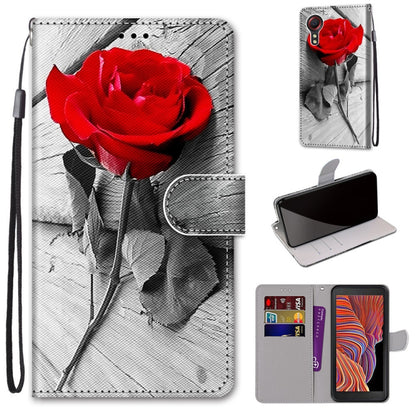 Red rose on black-and-white leather-look phone wallet case with lanyard and card slots