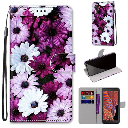 Purple and white flower print leather-look phone wallet case with lanyard and card slots