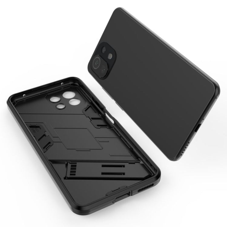 Shockproof phone case opened to show inner frame, black TPU/PC for Xiaomi Mi 11 Lite