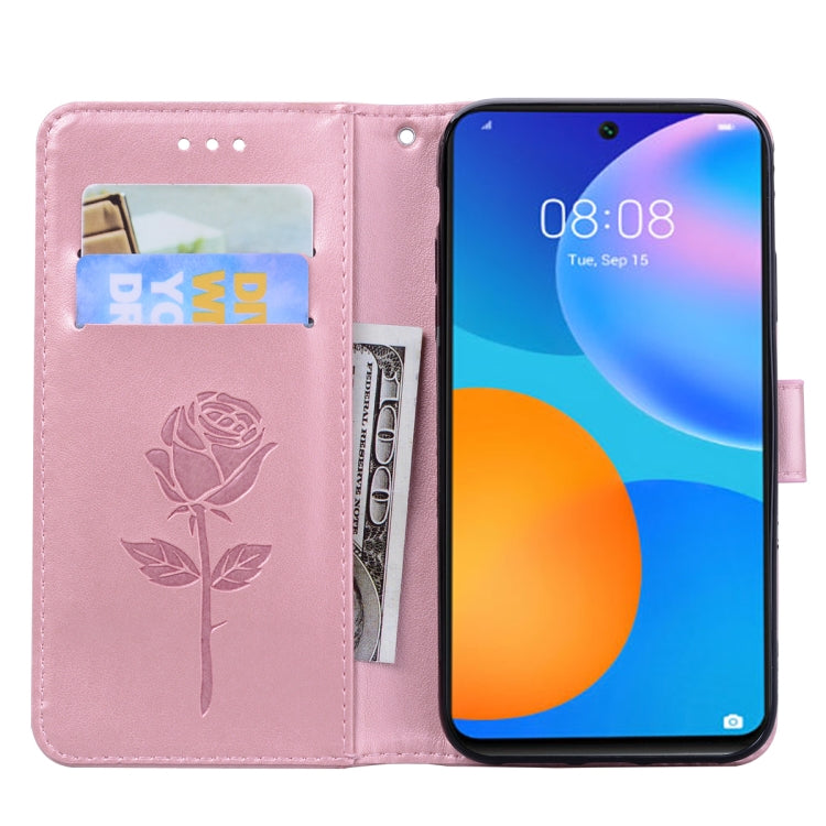 Pink PU leather flip phone wallet case with rose embossing, card slots, and window cover