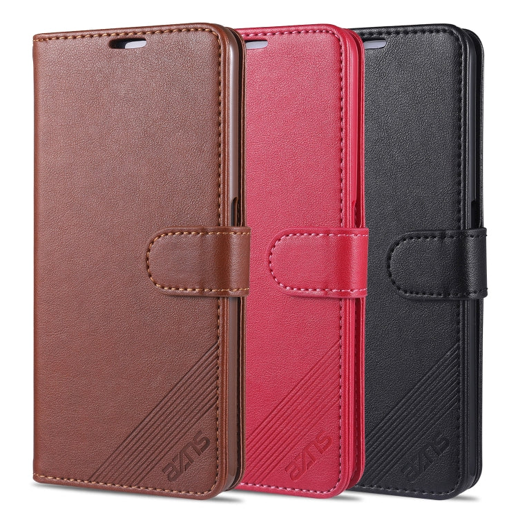 Leather flip phone cases in brown, red, and black with strap closure and card holder