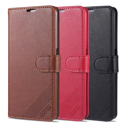 Leather flip phone cases in brown, red, and black with strap closure and card holder