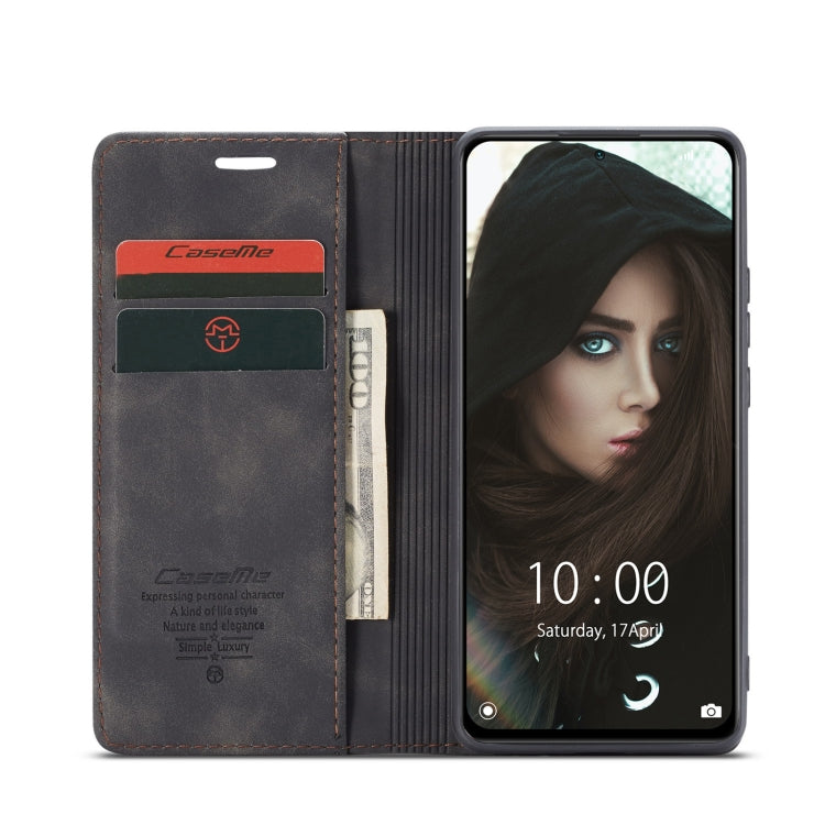 Black leather flip wallet case open with card slot panel and phone screen visible