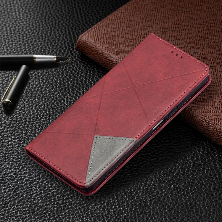 Red leather flip phone case with rhombus texture, gray card panel, and stitched trim