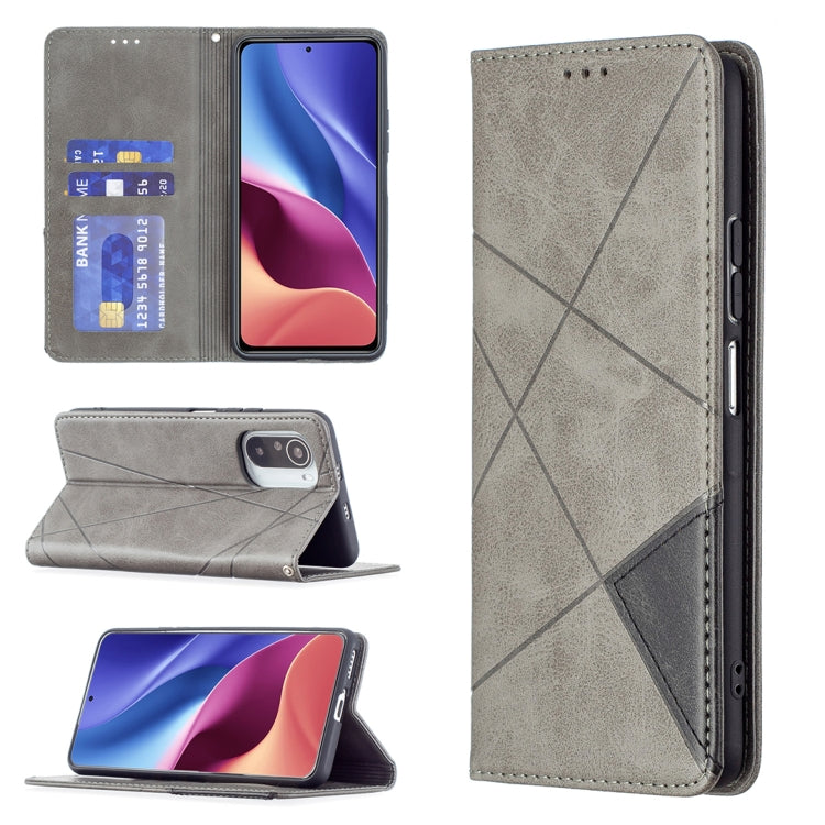 Gray leather flip phone case with rhombus texture, card slots, and magnetic closure