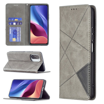 Gray leather flip phone case with rhombus texture, card slots, and magnetic closure