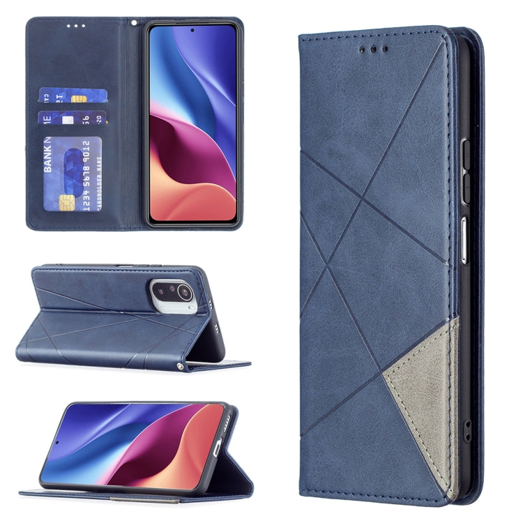 Blue leather flip phone case with rhombus texture, card slots, and magnetic closure
