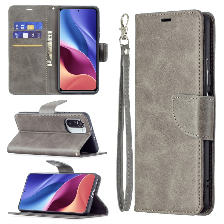 Light gray PU flip phone case with card slots and wrist lanyard