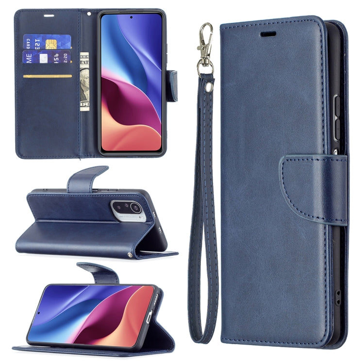 Blue PU flip phone case with wallet card slots and wrist lanyard