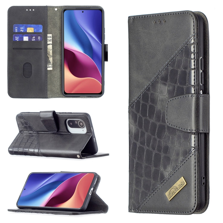 Gray crocodile-texture flip phone case with wallet, card slots, and kickstand