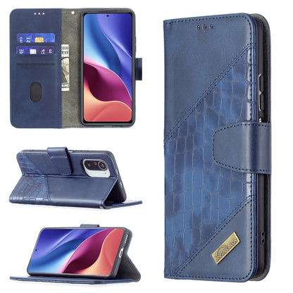 Blue crocodile-texture flip phone case with wallet, card slots, and kickstand
