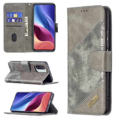 Gray crocodile-texture flip phone case with wallet, card slots, and stand