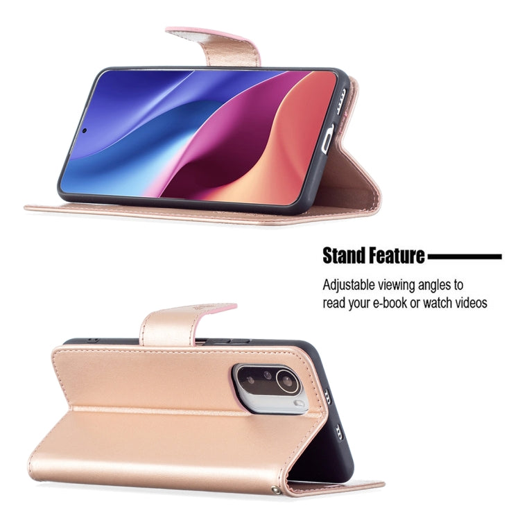 Rose gold leather phone case with butterfly embossing and fold-out stand for viewing