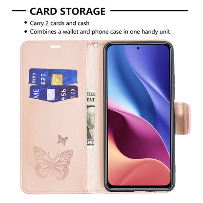 Rose gold leather phone case with card slot, embossed butterflies, and lanyard